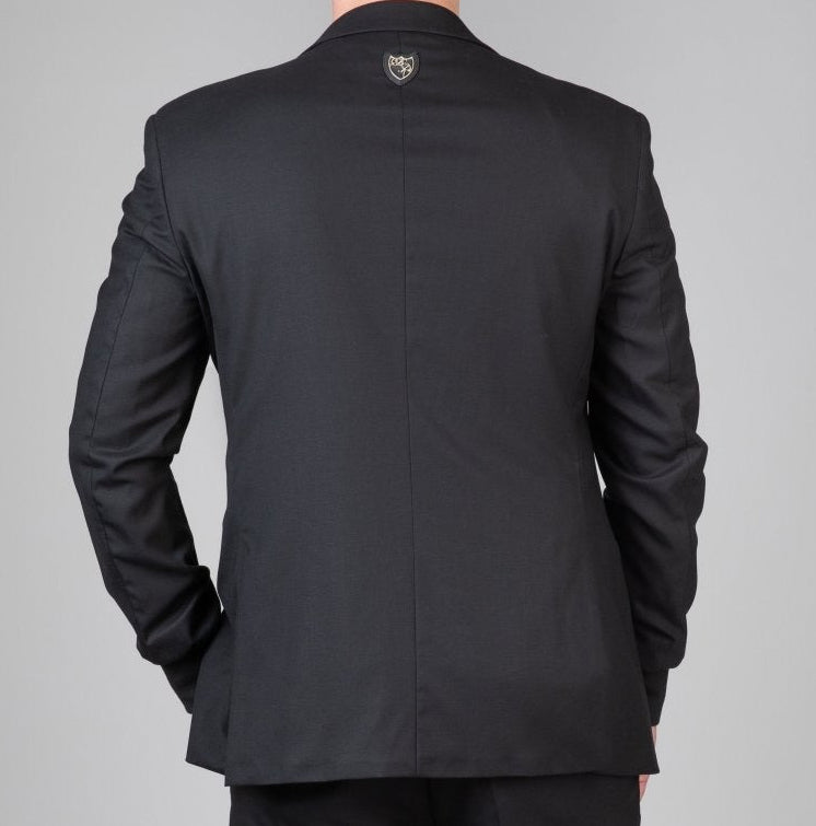 Rückenansicht des sportlichen Signature Anzugs - flexible Passform und dezentes, kraftvolles Design für maskuline Eleganz.