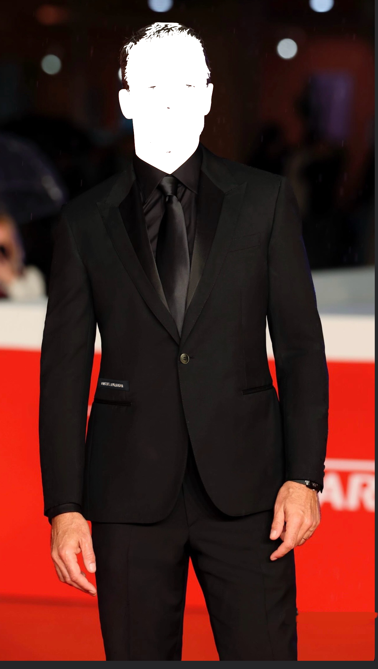 Gala Abend Kein Name. Kein Gesicht verlässt unseren Kreis.  Luxuriöser Anzug mit einen Spitzkragenrevers in schwarz