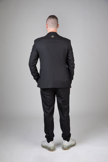 Rückenansicht des sportlichen Signature Anzugs - flexible Passform und dezentes, kraftvolles Design für maskuline Eleganz.